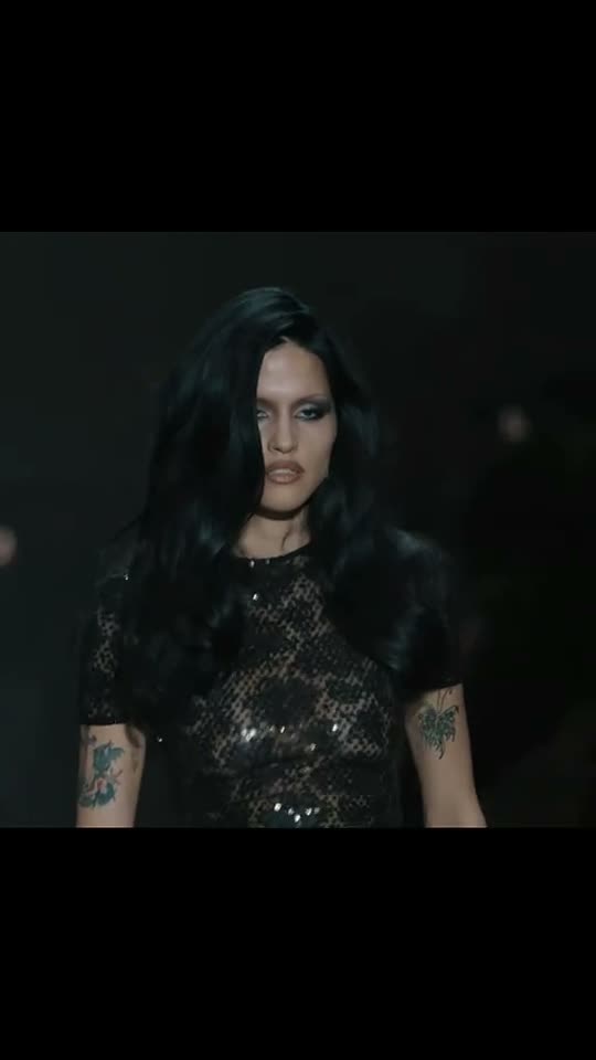 Model walking on runway