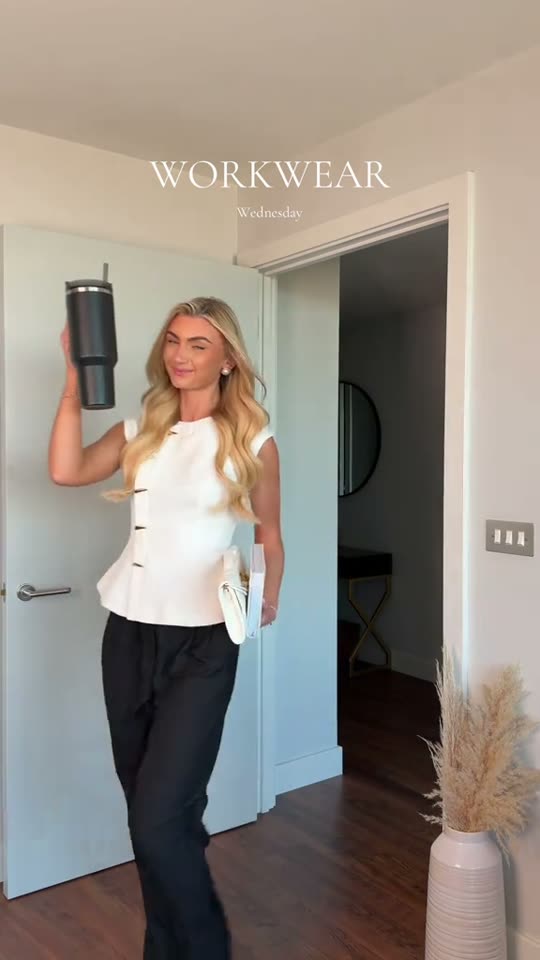 Woman shows office outfit
