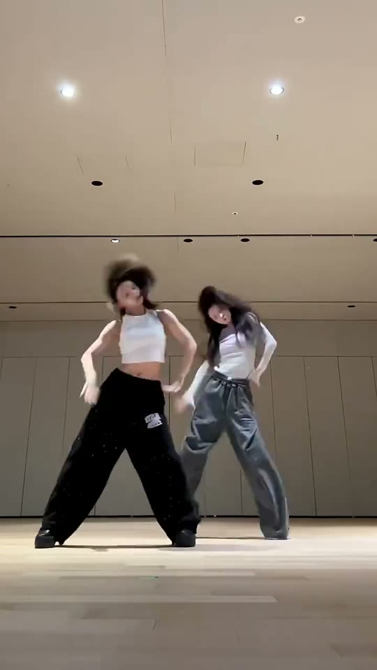 Two women dancing K-pop