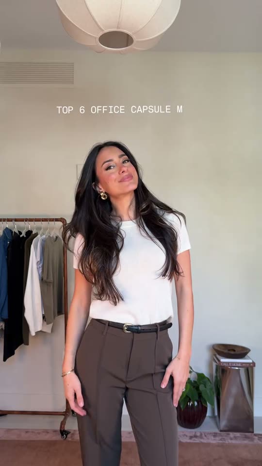 Woman showing office capsule outfits