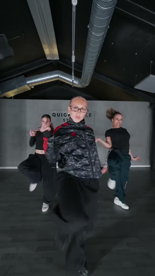 Three dancers perform hip-hop