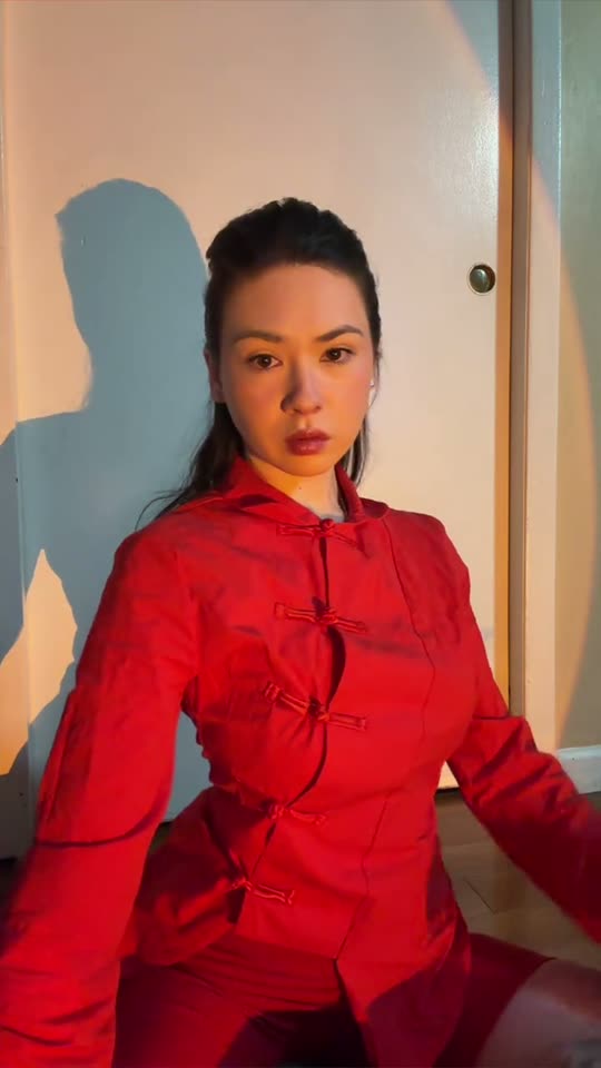 Fan transition into a red dress