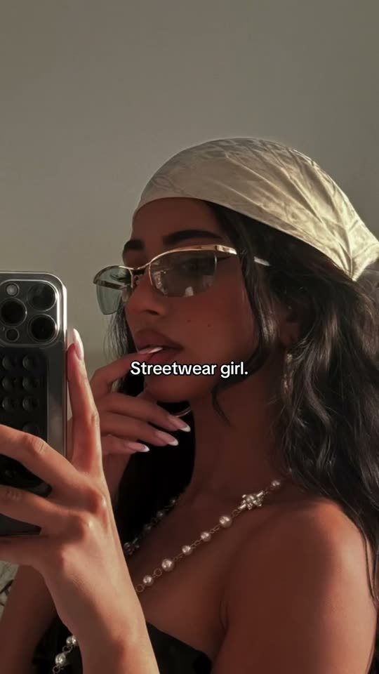 Girl shows off streetwear outfit
