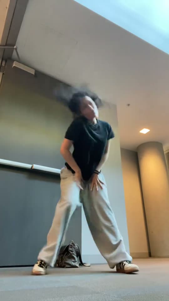 Woman dancing with hair flying