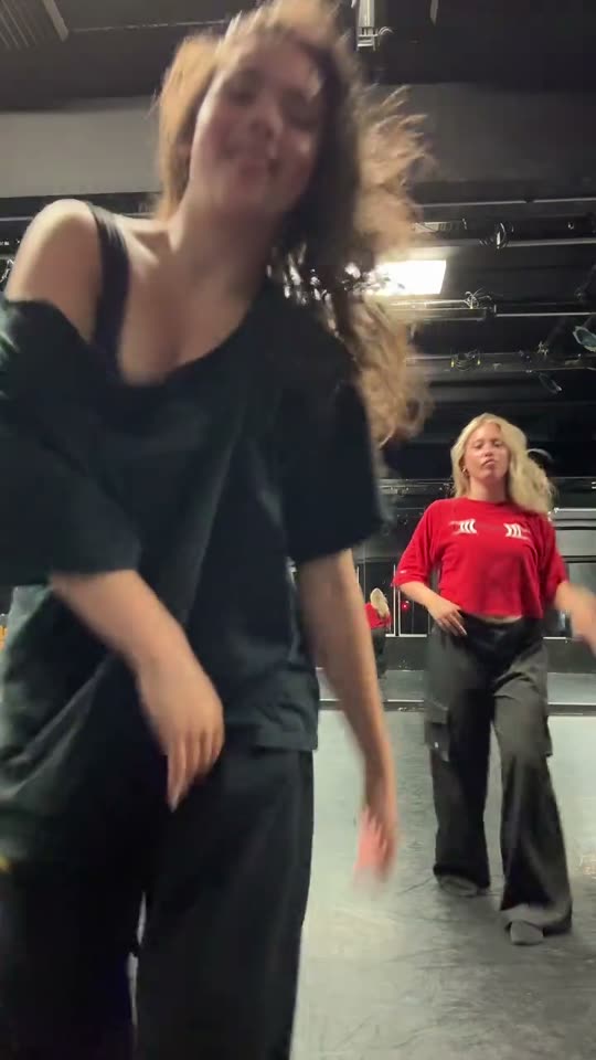 Two girls dancing together