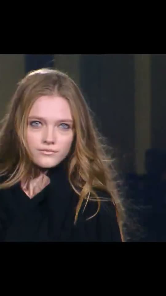 Model walking on runway