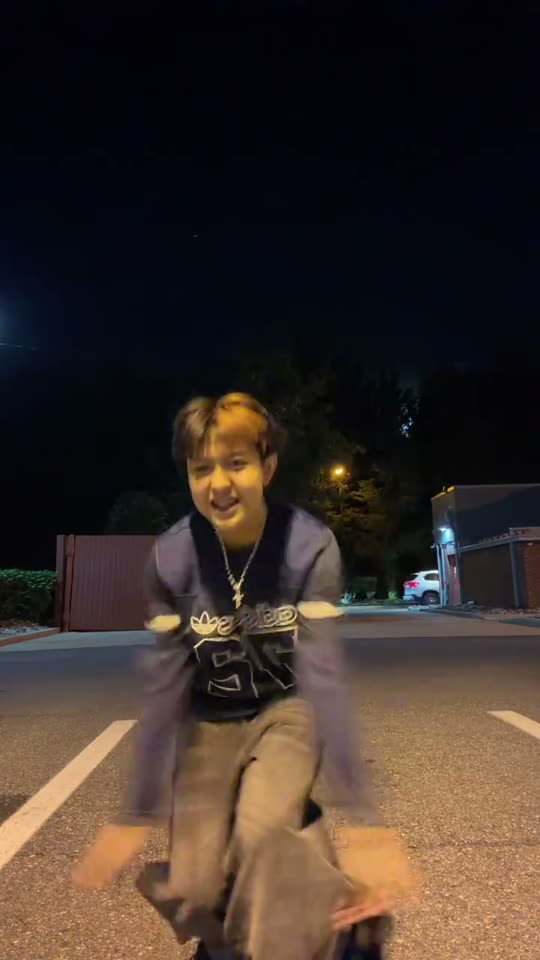 Man dancing in parking lot