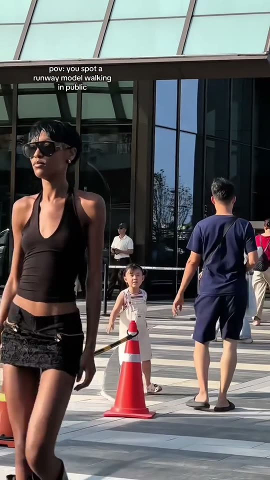 Model walks in public