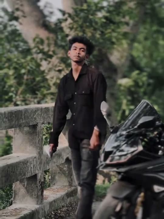 Man walking by motorcycle