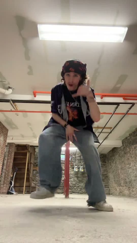 Person dancing in basement