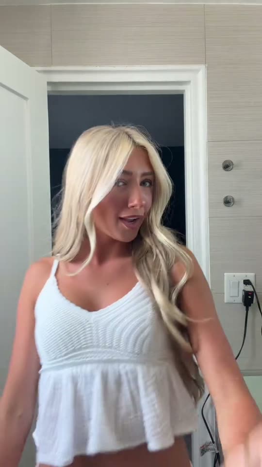 Outfit transition in bathroom