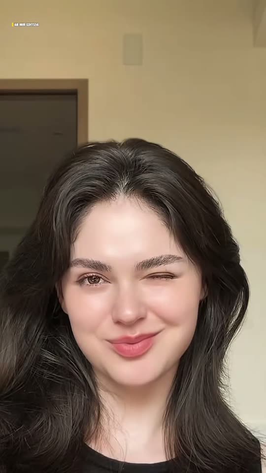 Woman winks at camera