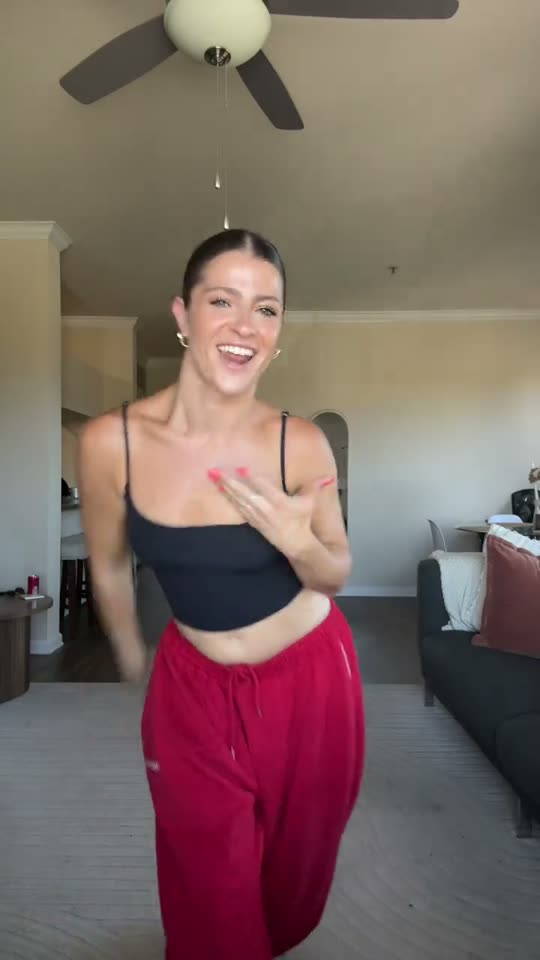 Woman dancing in living room
