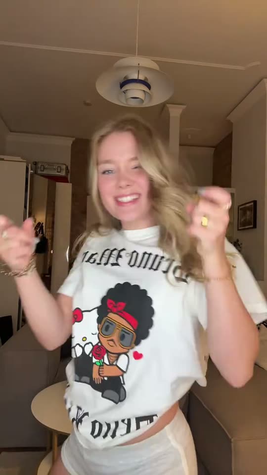 Girl dancing in white shirt