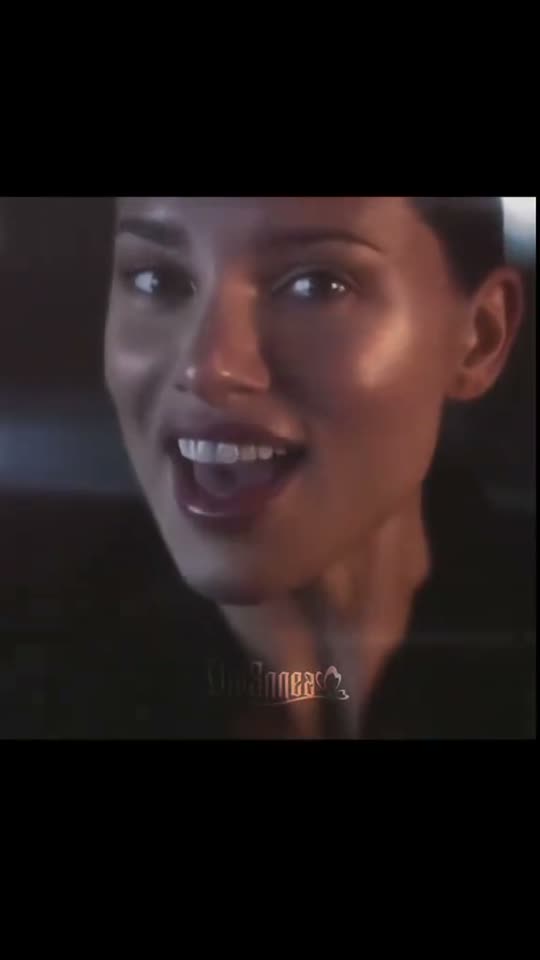 Woman smiles and looks around