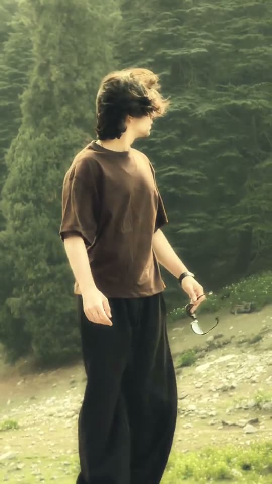 Wind blows hair in nature