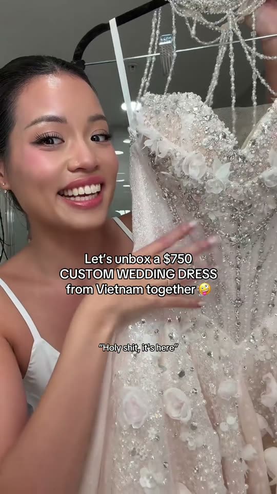 Unboxing a custom wedding dress