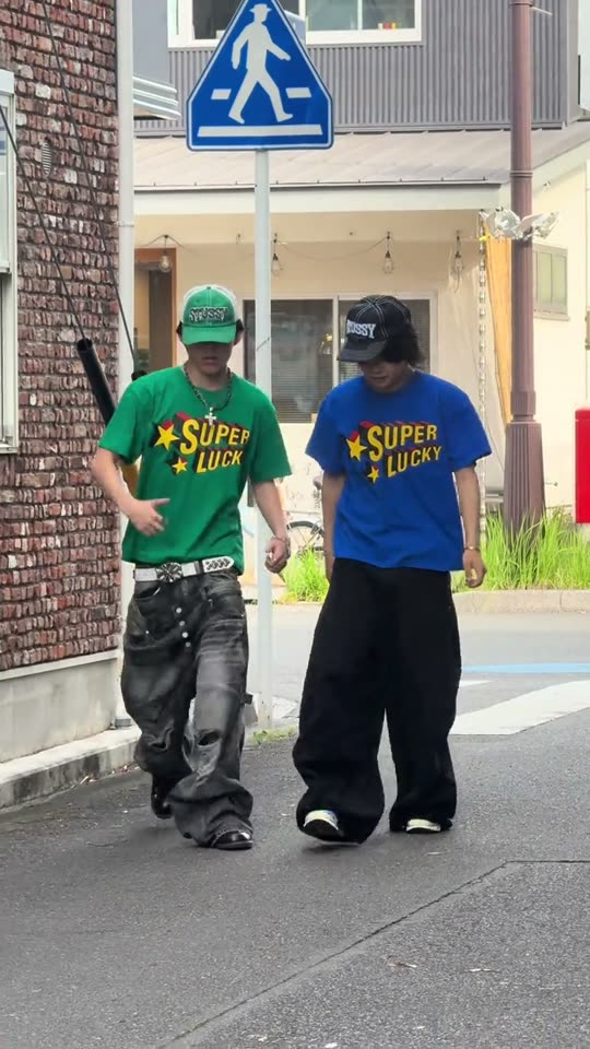 Two men walking street