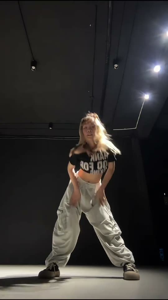 Woman dancing in studio