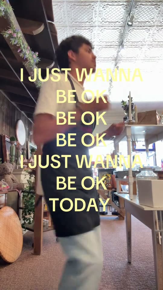 Man dancing in a shop