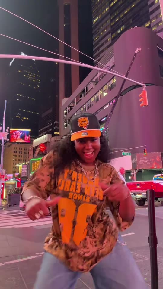 Woman dancing in Times Square