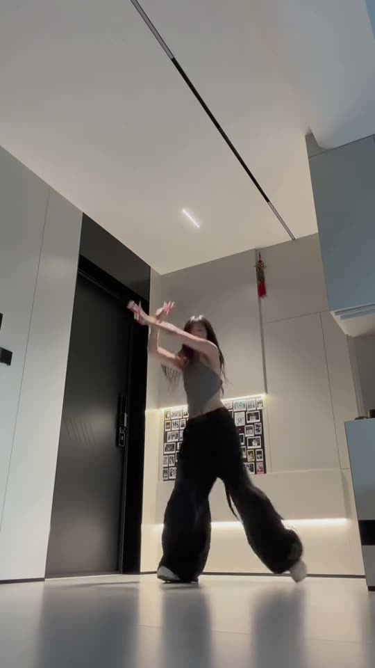 Woman dancing in a room