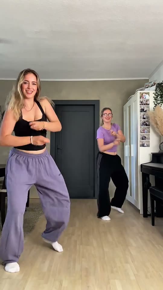 Two women dancing together