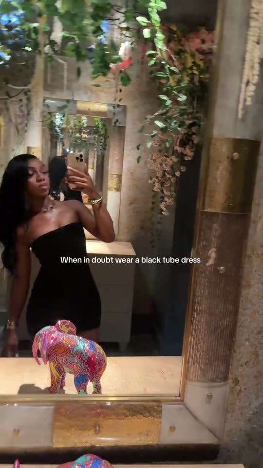 Mirror selfie in black dress
