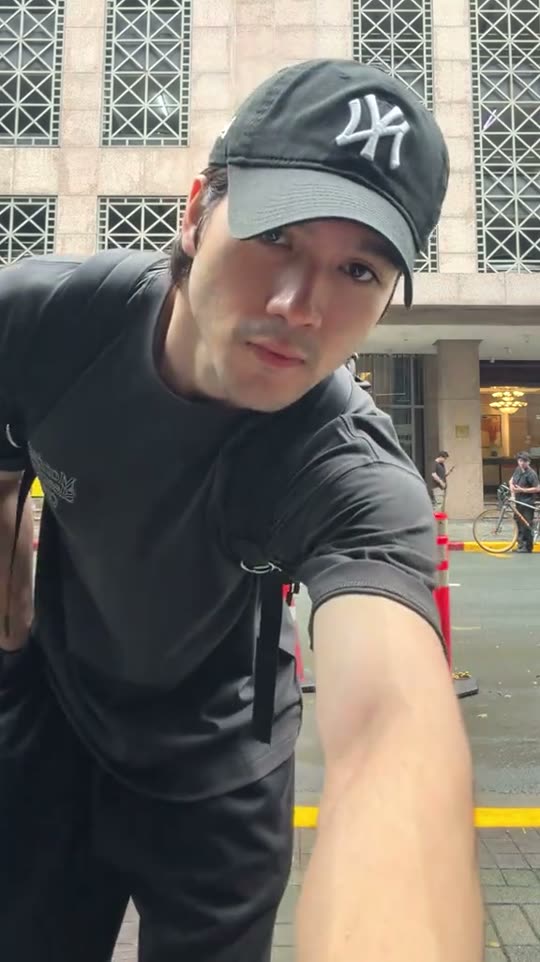 Man shows his outfit