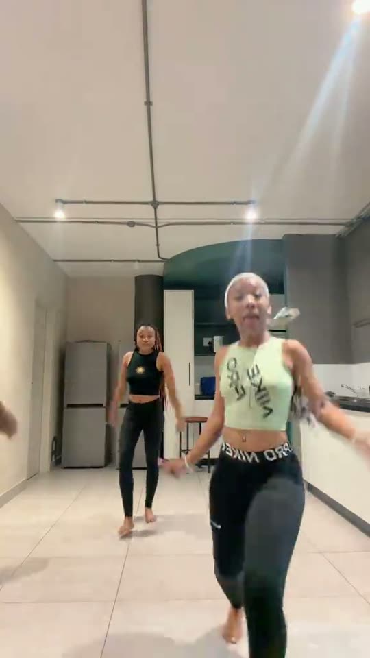 Two women dancing together
