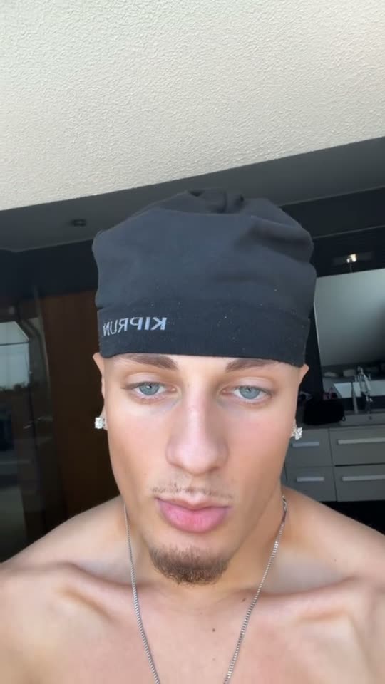 Man with blue eyes posing