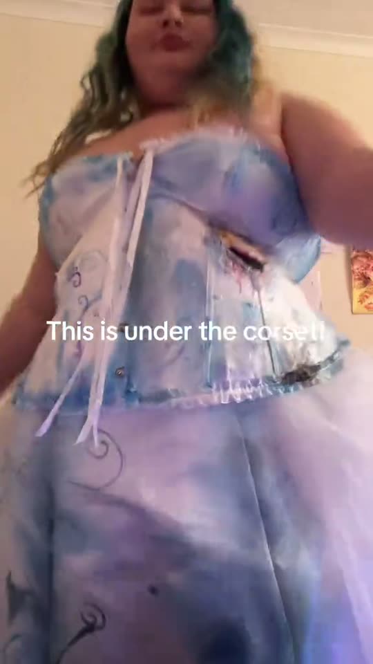 Costume reveal with corset
