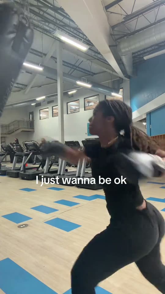 Woman boxing in gym