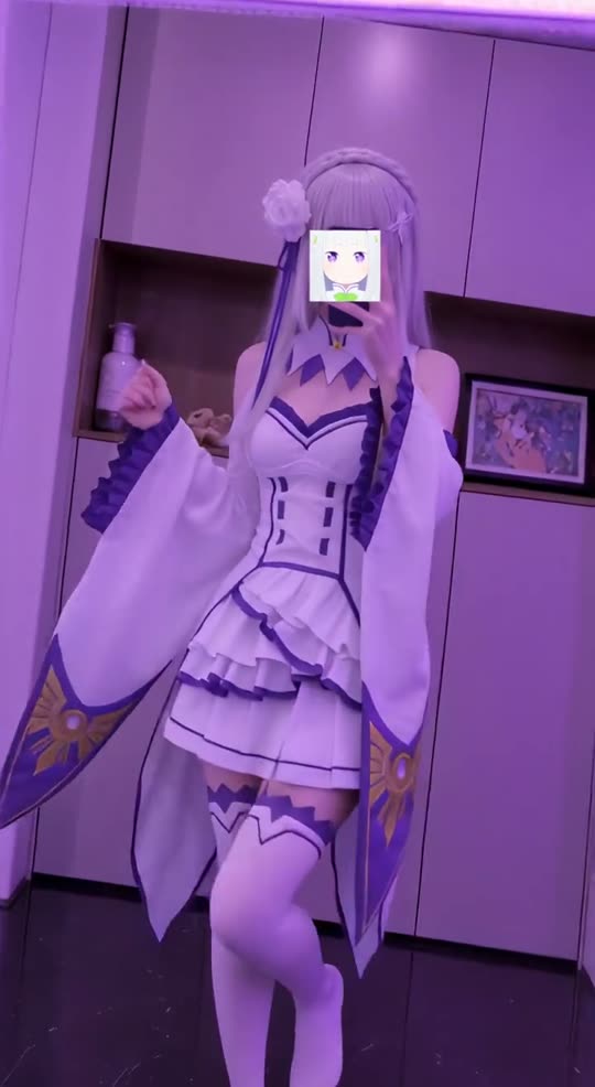 Cosplayer poses in anime outfit