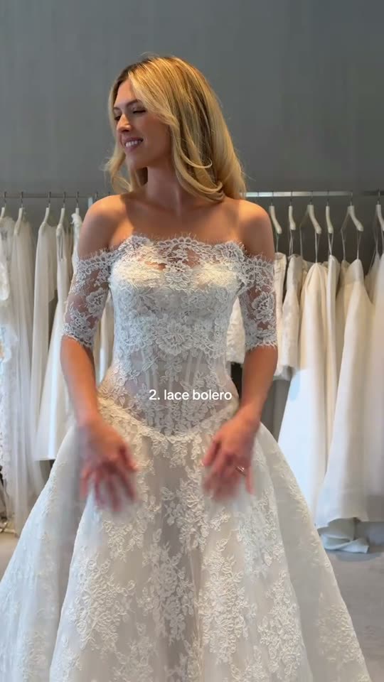 Woman tries on wedding dress