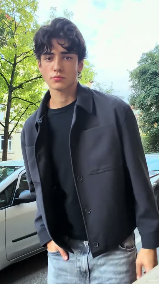 Man shows his outfit