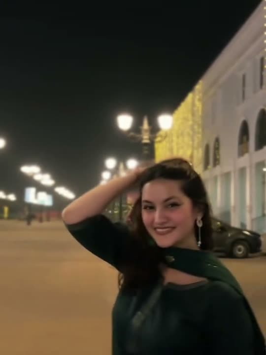 Woman smiles and poses