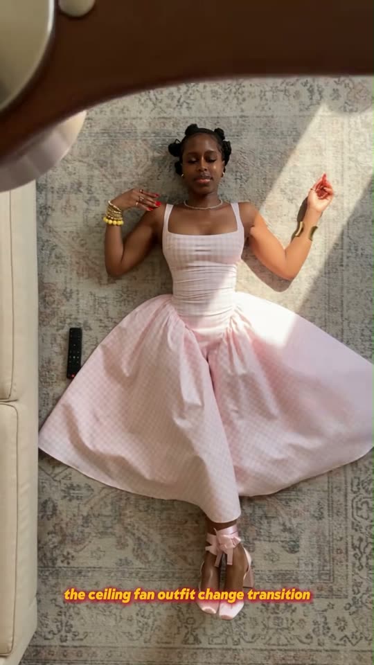 Fan transition into a pink dress