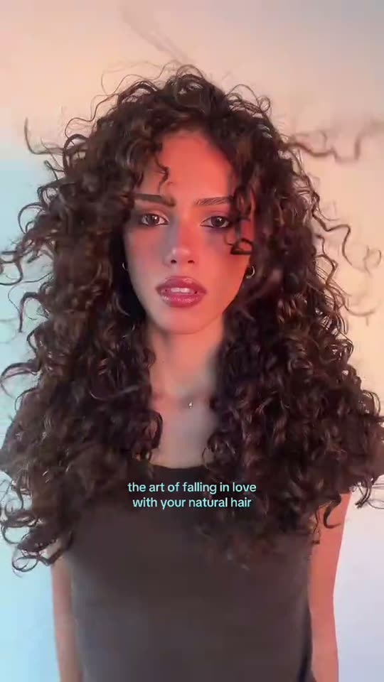 Woman shows off curly hair