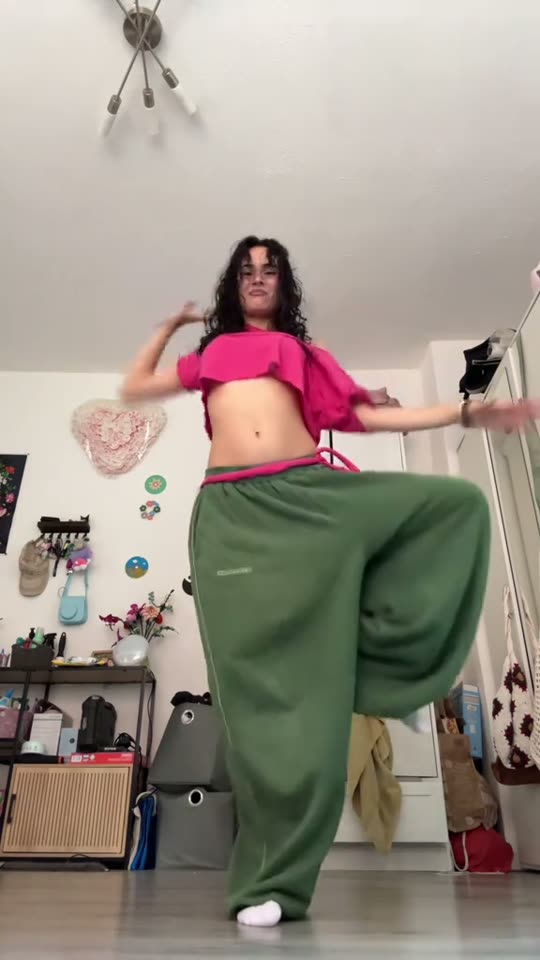 Woman dancing in baggy pants