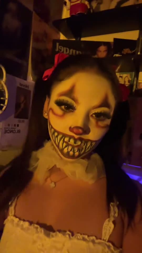 Girl reveals scary clown costume