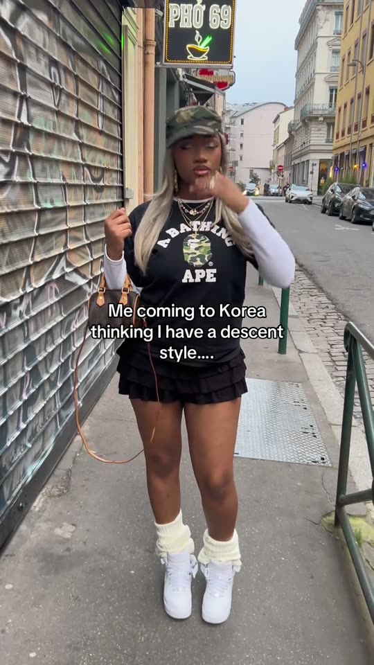 Woman poses in street style