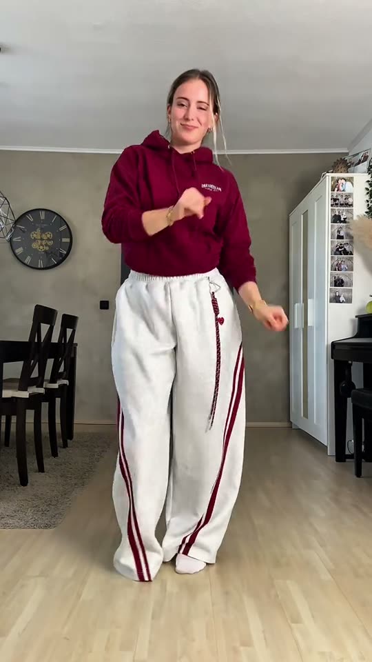 Woman dances in casual clothes