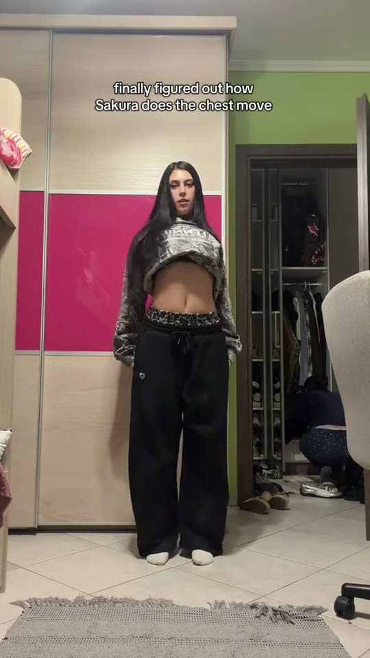 Woman dancing in a bedroom