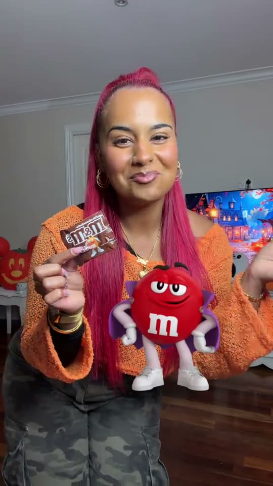 Woman dancing with M&M's