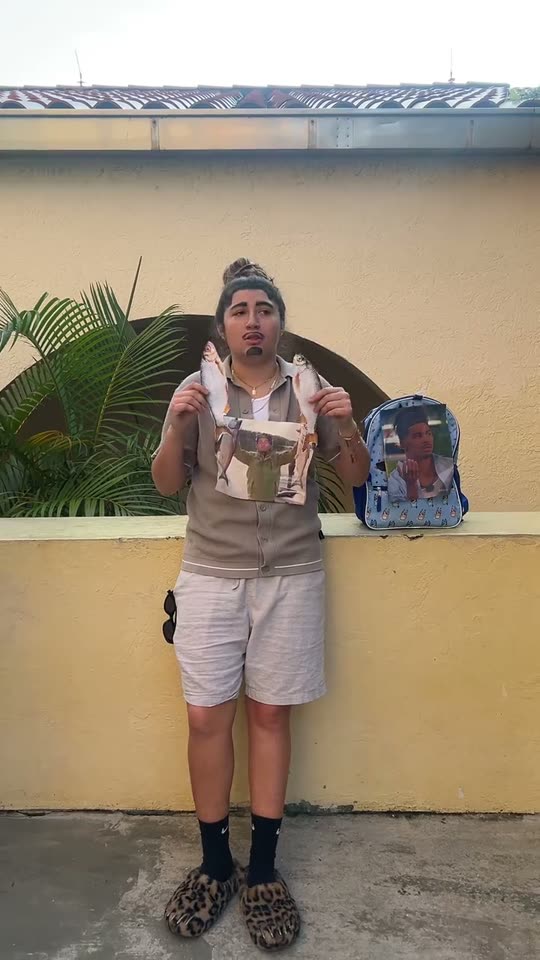 Man holds two fish