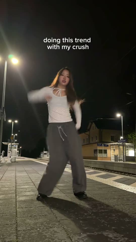 Woman dancing at night