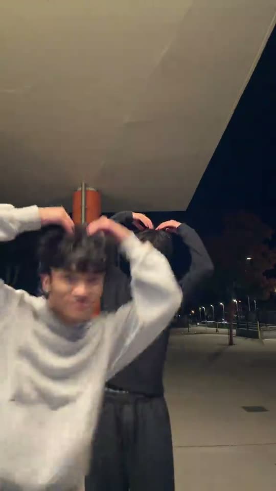 Two men dancing together