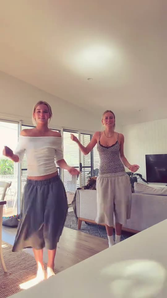 Two women dancing together