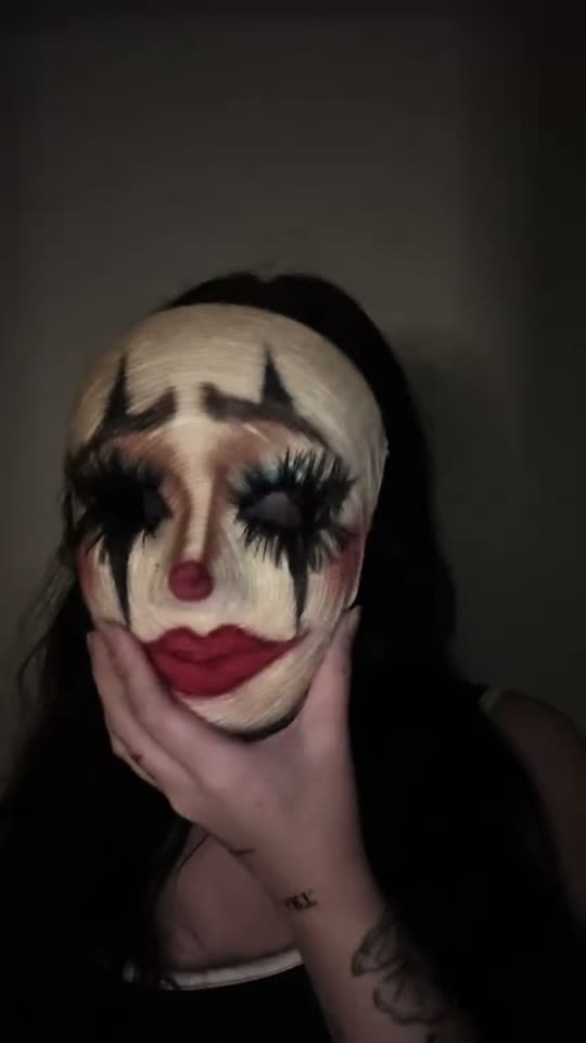 Woman in scary clown makeup